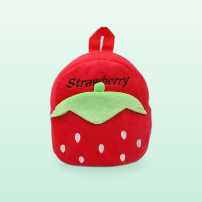 Red strawberry plush mini backpack with a green leaf, front view, on a mint green background