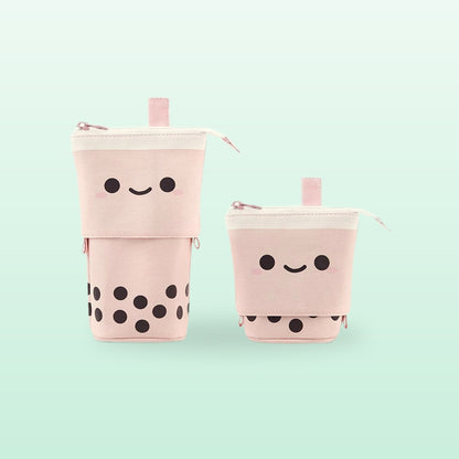 Pink boba milk tea pen pouch shown tall and folded down, on a mint background