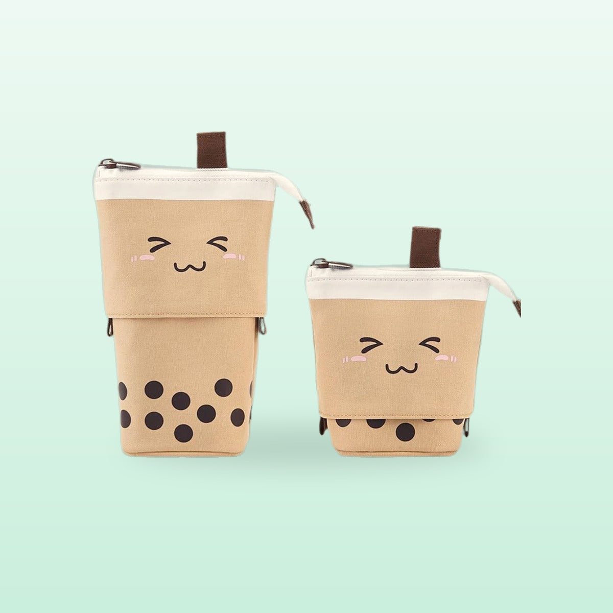 Brown boba milk tea pen pouch with a squinting smile, shown tall and folded down, on a mint background