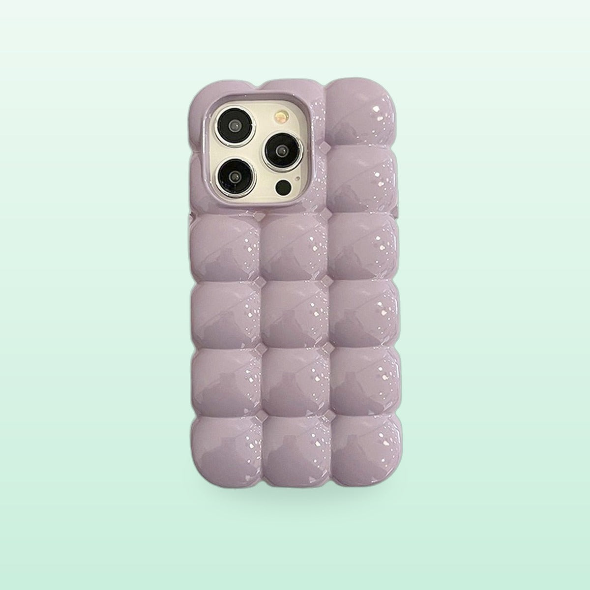 Bubble block iPhone case in purple with puffy glossy squares, back view on a mint background