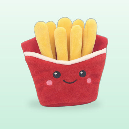 French fries plush pet toy, a smiling red carton with yellow plush fries, on a mint background