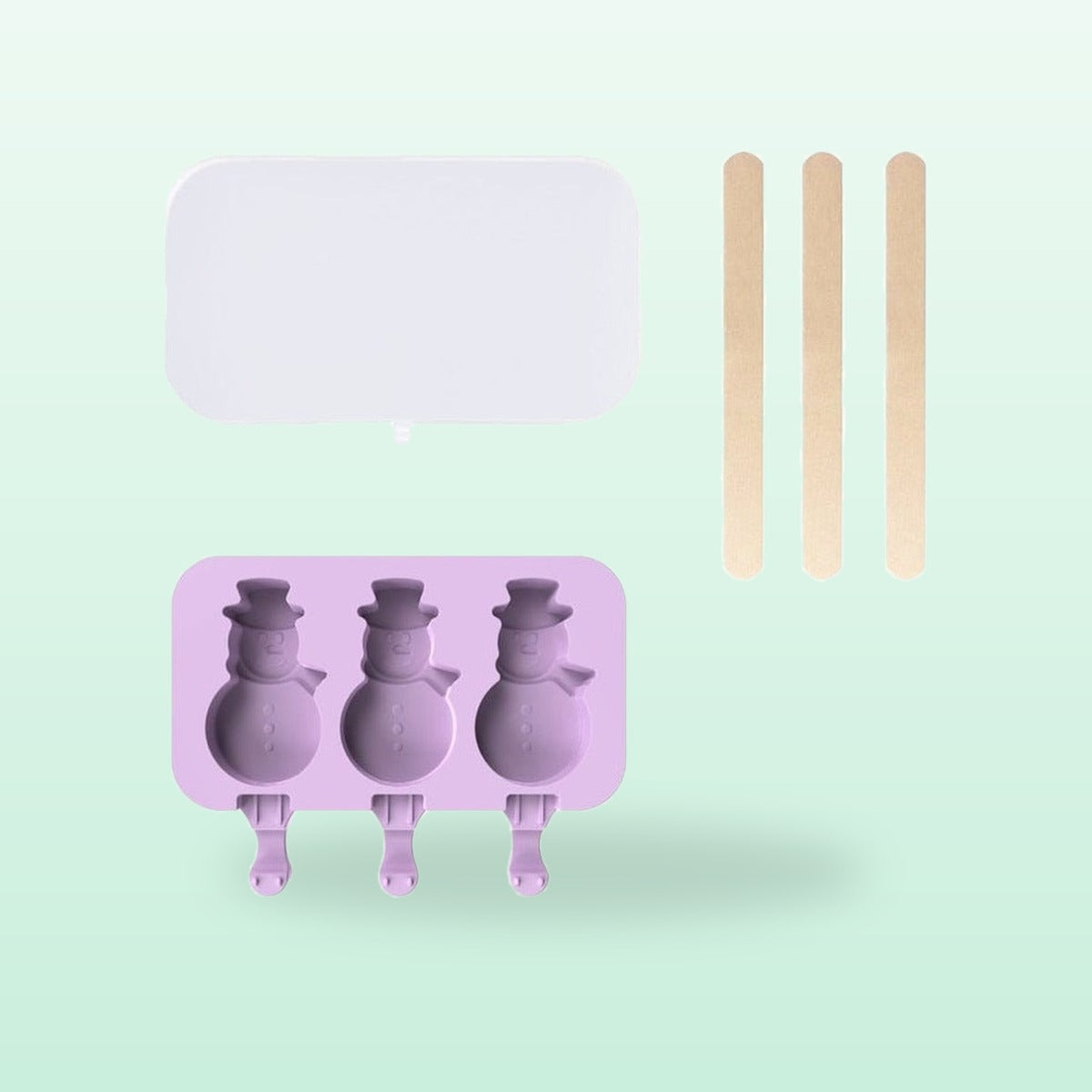 Snowman silicone ice lolly mould, lilac, with lid and sticks, on a mint green background