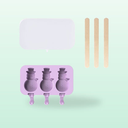 Snowman silicone ice lolly mould, lilac, with lid and sticks, on a mint green background