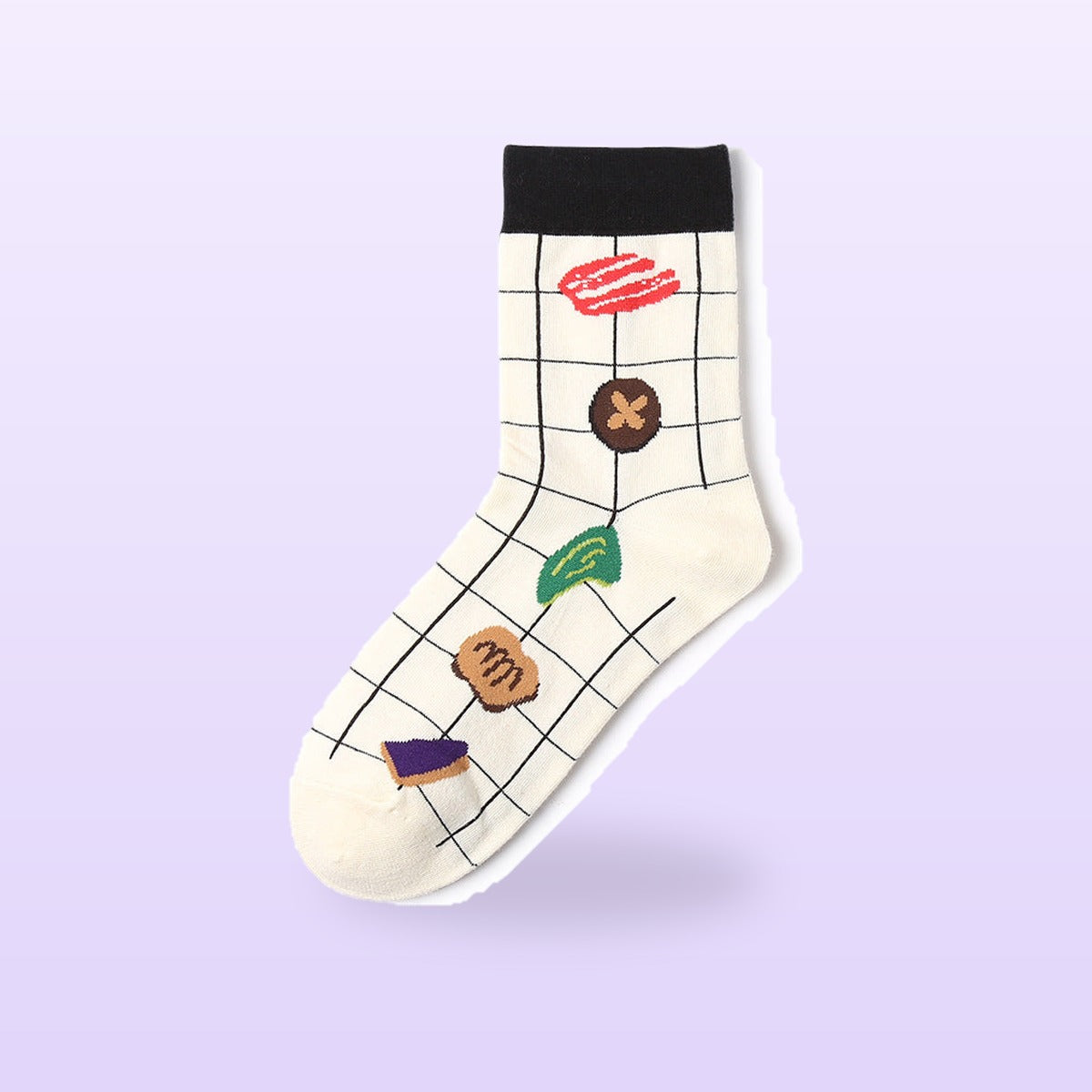 Cream grid cotton sock with a black cuff and little food motifs, on a soft lilac background