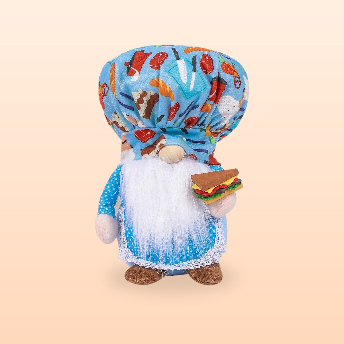 Blue hamburger chef plush gnome with a food print hat, white beard and a sandwich, on a peach background