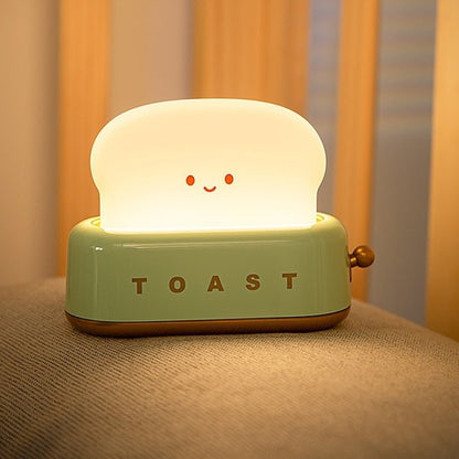 Green toast night light with battery life and USB C charging details