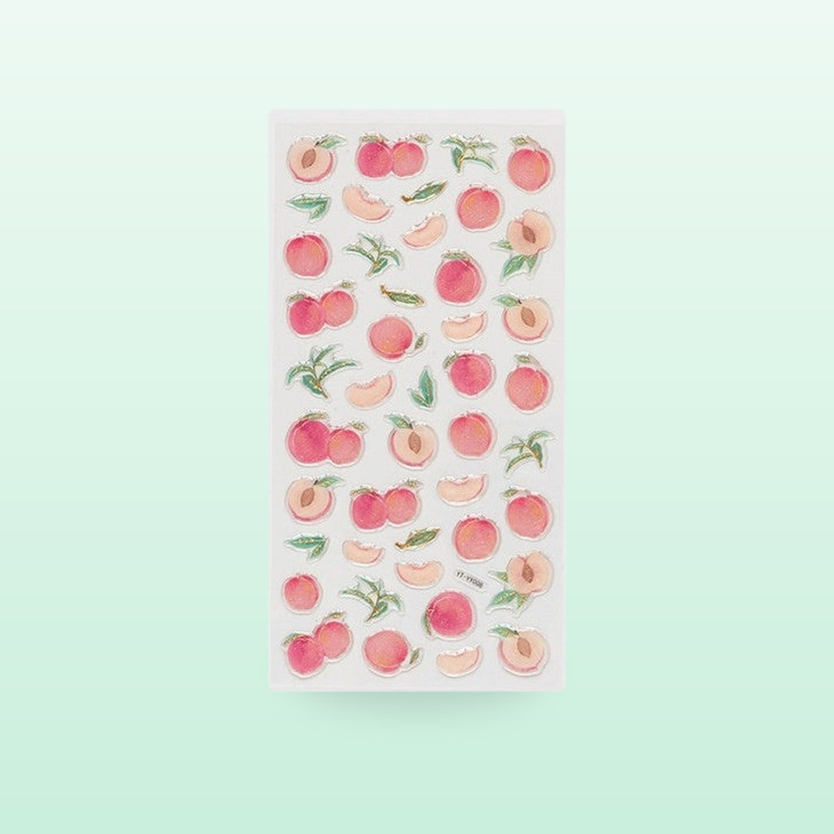 Peach metallic sticker sheet with pink peaches, slices and leaves, on a mint green background