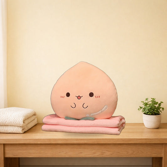Peach plush pillow and folded pink blanket on a light oak bench