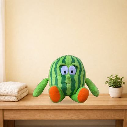 Watermelon fruit and veg buddies plush sitting on a light oak bench