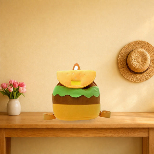 Hamburger plush kids backpack on a light oak console table