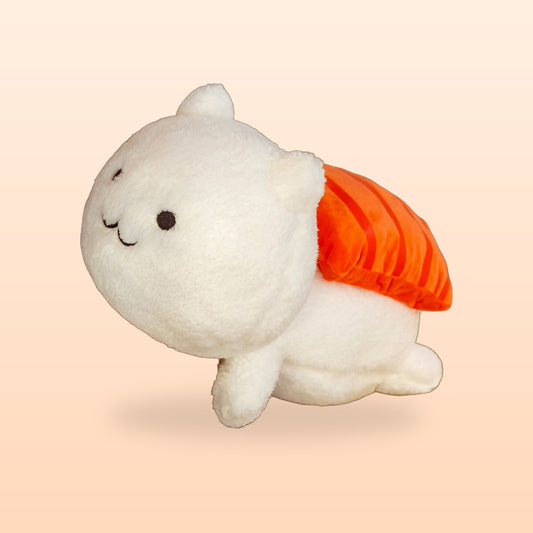 Sushi cat plush pillow with a salmon topping, on a soft peach background