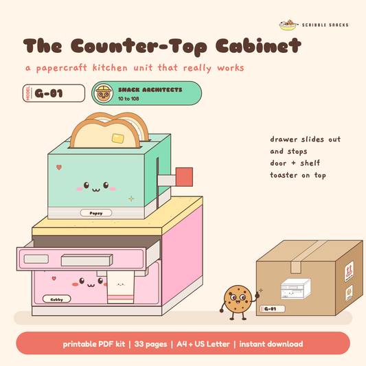 Counter Top Cabinet papercraft built, a pink kitchen unit with its drawer pulled out and Toasty's toaster on the worktop