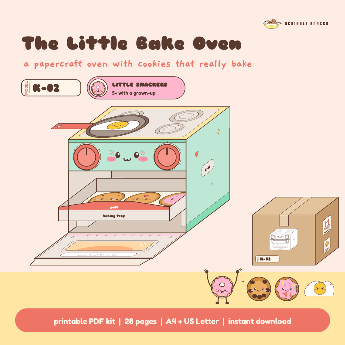The Little Bake Oven papercraft built in mint with the door open, cookies on the tray and its flat pack carton