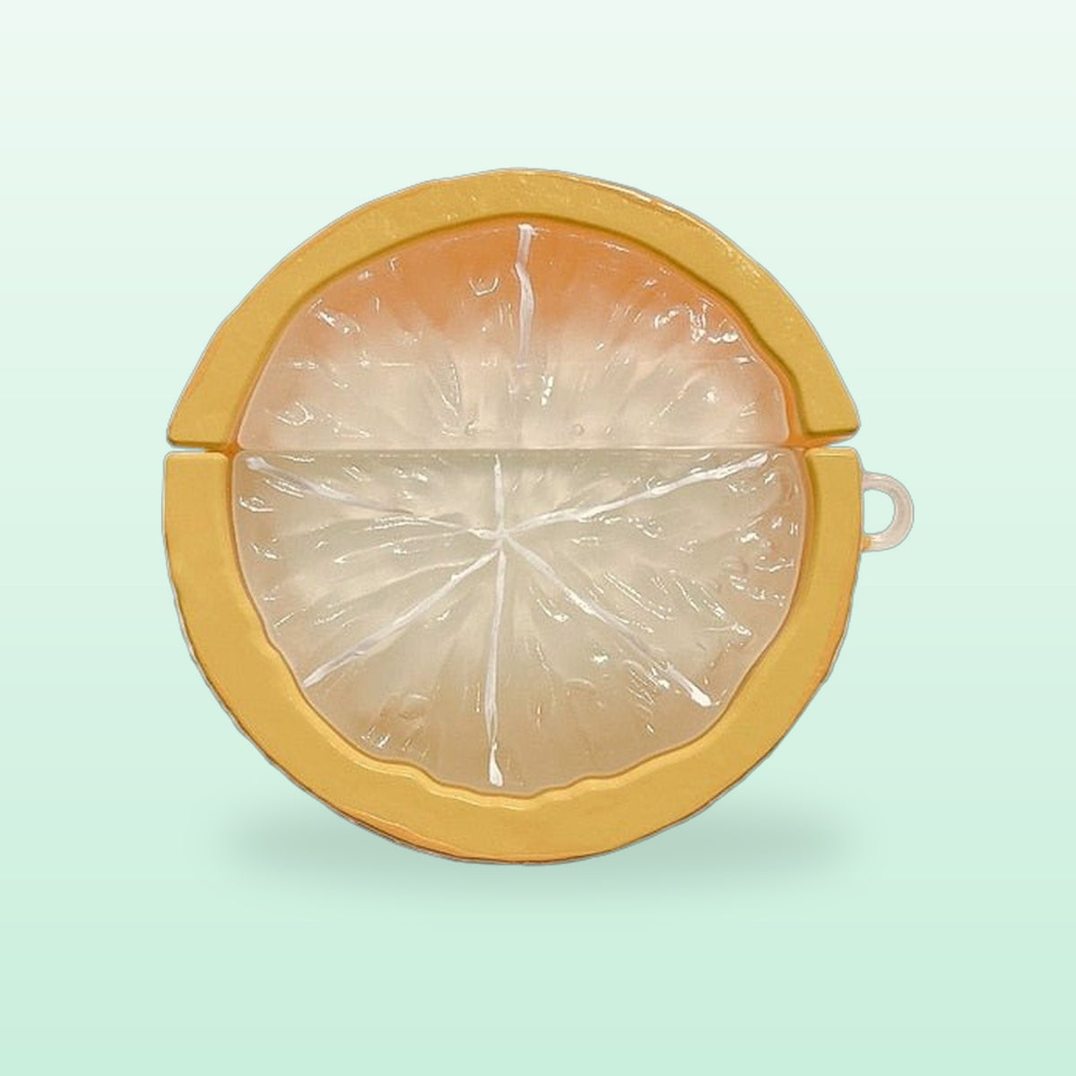 Yellow lemon slice silicone AirPods case, front view, on a soft mint background