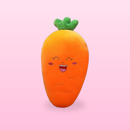 Smiling orange carrot plush pillow with a green leafy top, on a bubblegum pink background