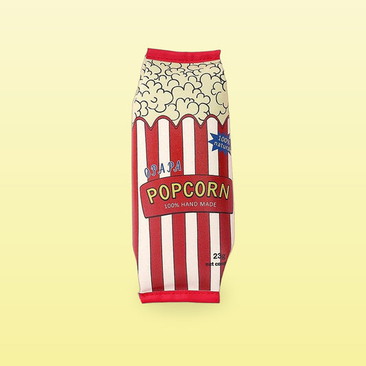 Popcorn snack packet pencil case with red and white stripes, on a butter yellow background