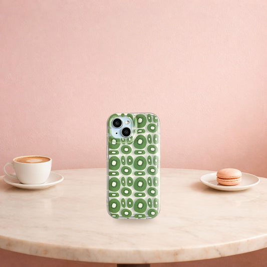 Kiwi fruit clear iPhone case standing on a white marble cafe table