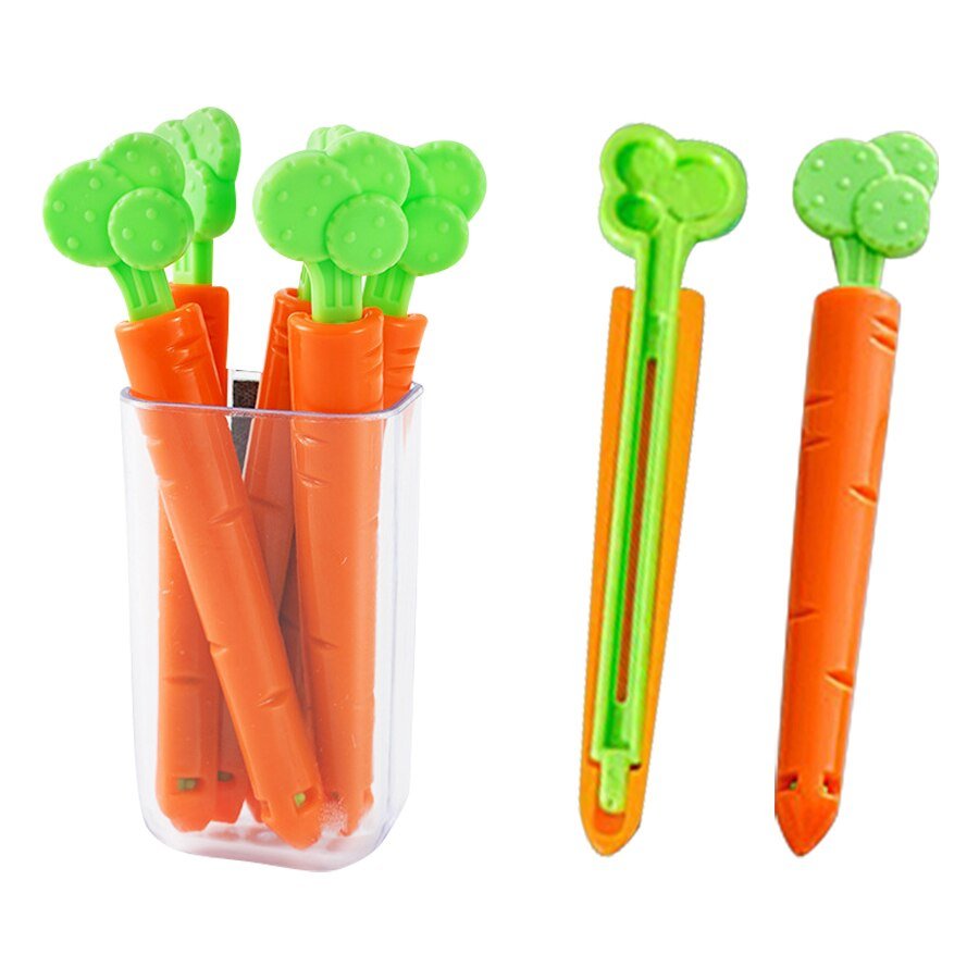 Carrot food bag clips in a clear magnetic holder, with one clip shown open