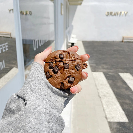 Chocolate choc chip cookie case for AirPods held in hand
