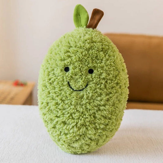 Fluffy avocado half plush with a brown stone