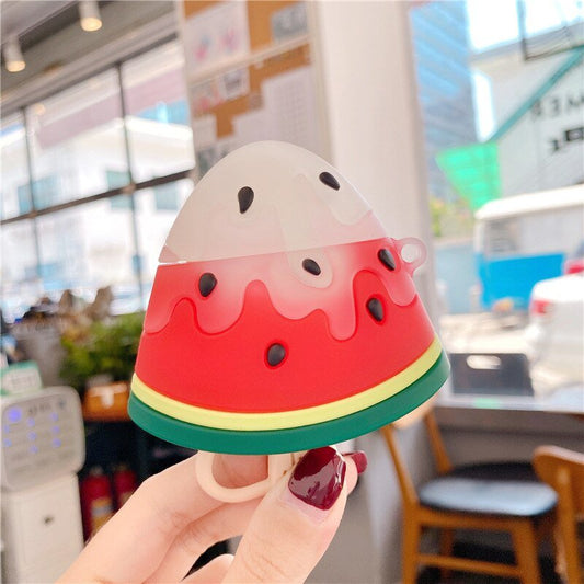 Watermelon ice lolly AirPods Pro case held up in a cafe